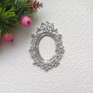 Рамка Овальна з квітами, гнучка, срібний металік, 4,6*6,5 см.